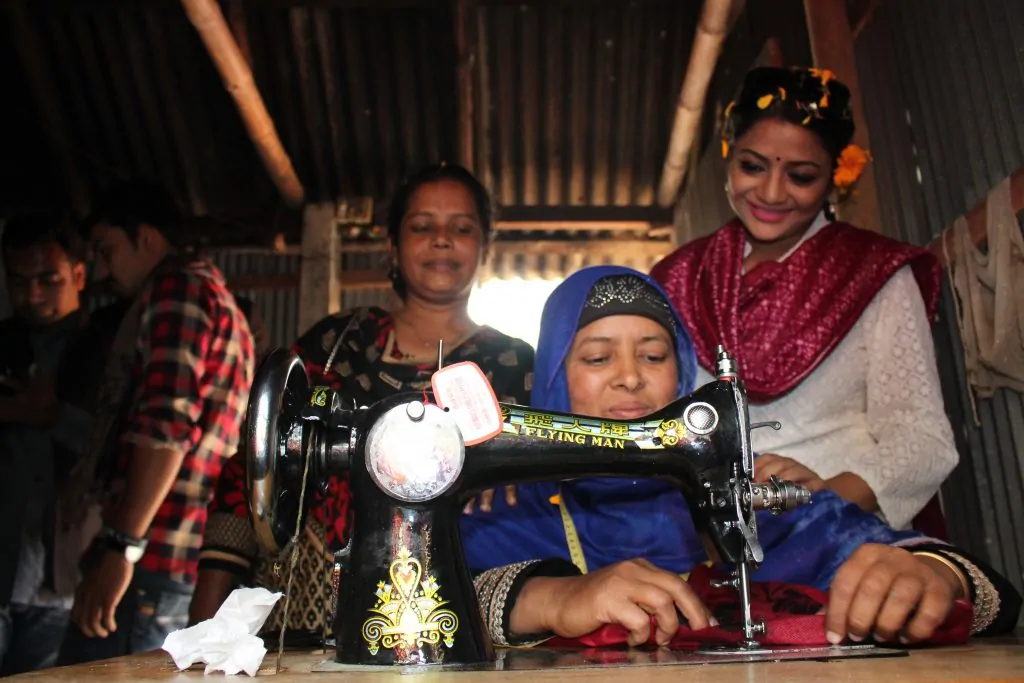 Renowned artists of the country inspiring rural women and seeking blessings for Sheikh Hasina during a visit to "Sheikh -Hasina Community Sewing Centre".