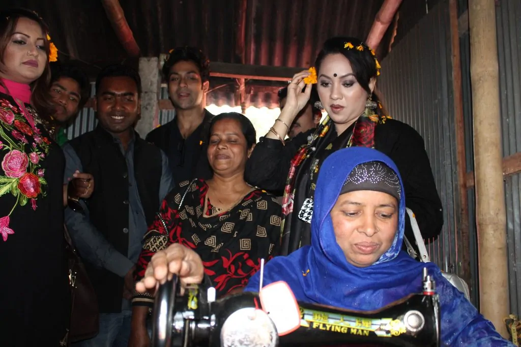 Renowned artists of the country inspiring rural women and seeking blessings for Sheikh Hasina during a visit to "Sheikh- Hasina Community Sewing- Centre".